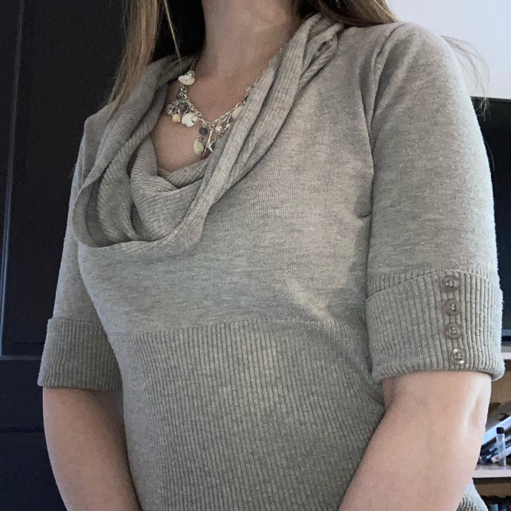 Beige ruffled neck sweater top